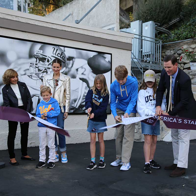 kids helping cut ribbon